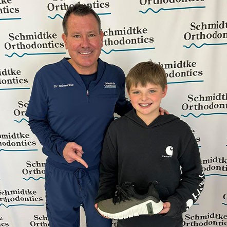 Patient smiling at our office