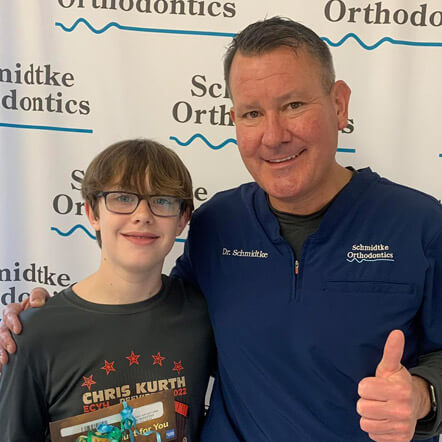 Patient smiling at our office